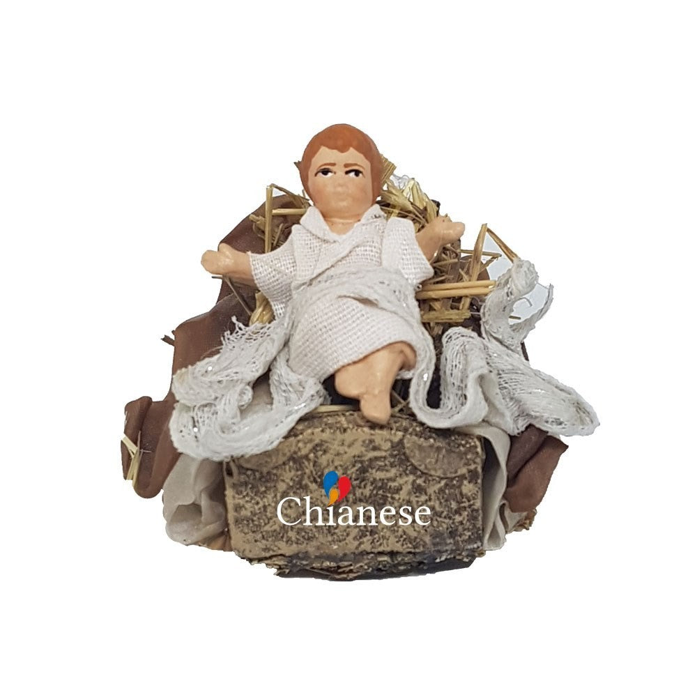 Pastore statuina Bambinello vestito con culla di legno per pastori di 14cm