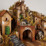 Presepe paesaggistico con fontana e mulino