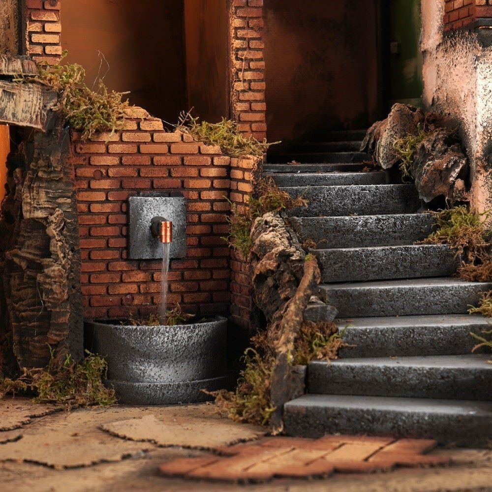 Presepe borgo semicircolare 84x60 con fontana e cucina