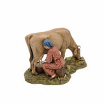Mungitrice con mucca cm 13 in resina in gift box